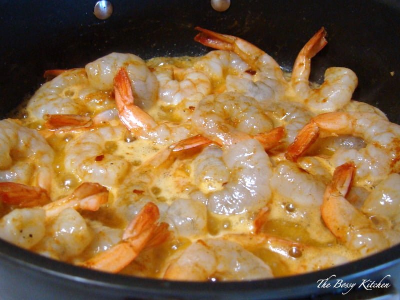 Sizzling Chili Shrimp-Spanish Recipe, or Gambas al Pil Pil (also known as Gambas al Ajillo) is a glorious dish that you will find in almost any restaurant in Spain.The dish is usually served as an appetizer, with crusty bread for dipping in the sauce.The recipe is very easy and takes no time to make. shrimp cooking in the pan with garlic and paprika