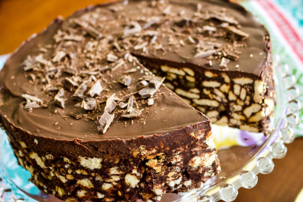This No Bake Chocolate Biscuit Cake is a beautiful, easy to make European dessert that is good for the entire family. It looks great as a cake for a fancier occasion, but equally delicious if shaped as a "salami", the traditional way of making it. No Bake Chocolate Biscuit Cake0