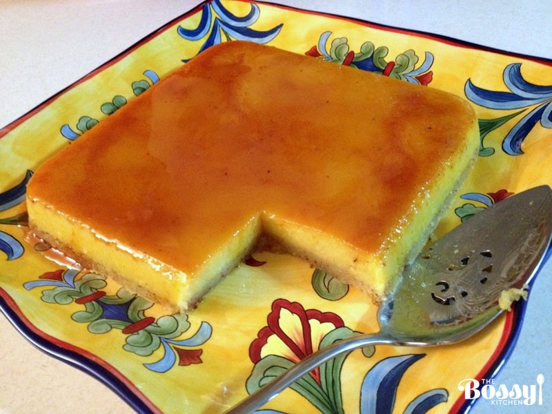 Orange-Almond Flan- served on a platter with a serving spoon