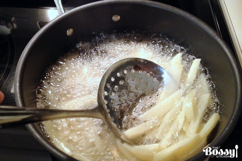 Potatoes in a bowl of water