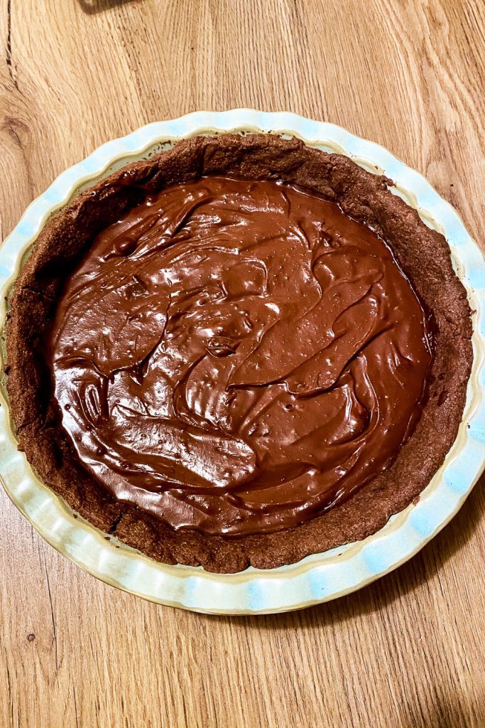 Baked chocolate tart crust with chocolate filling added