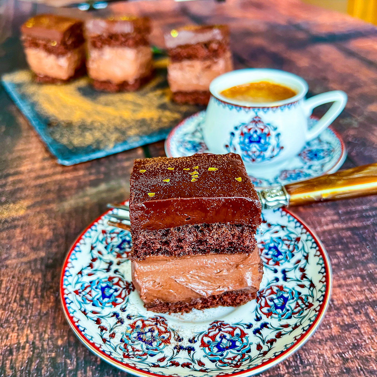 Slice of Hungarian Rigo Jancsi Chocolate Cake square photo0