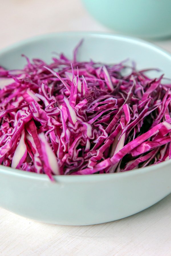 Shredded red cabbage in a bowl Shredded red cabbage in a bowl