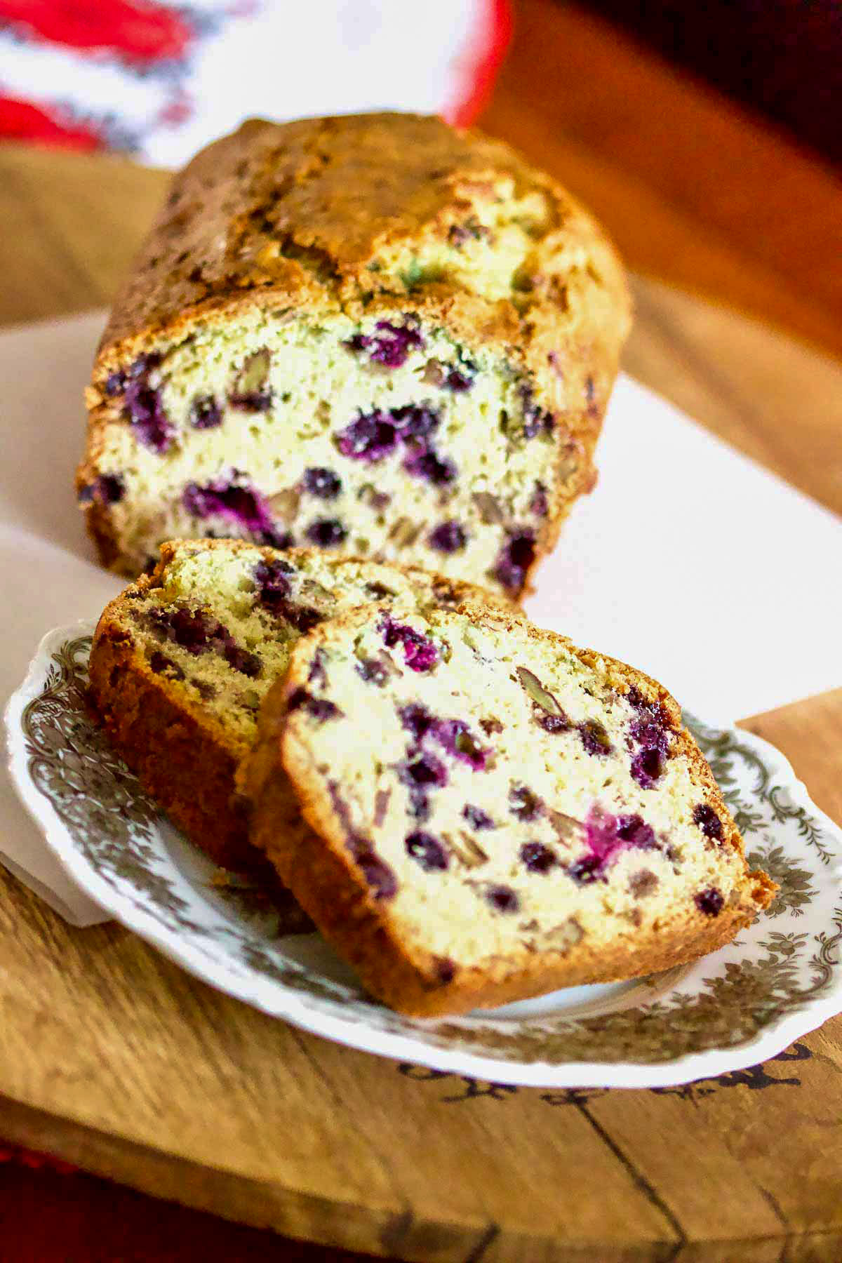 Blueberry Orange Nut Bread slices served on a plate.