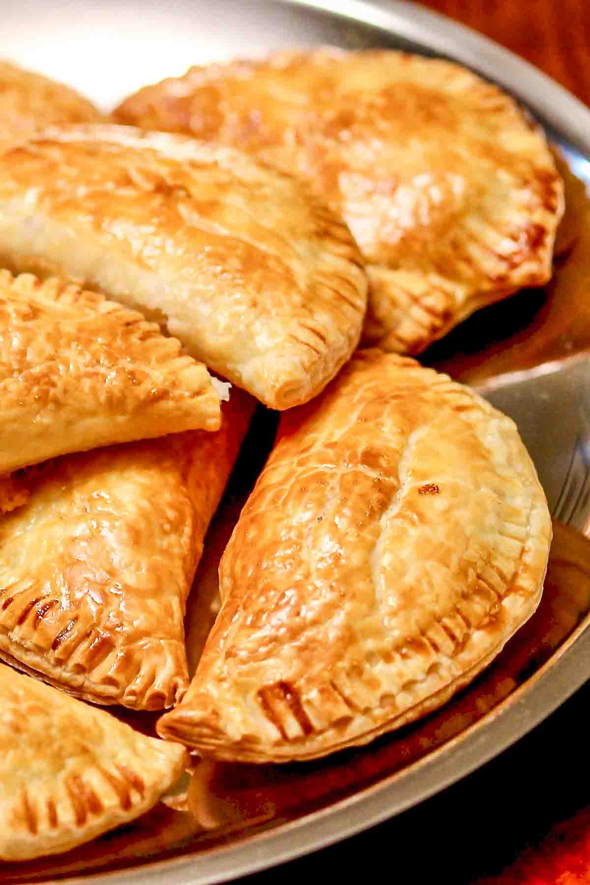 Ham and Cheese Pastries Stacked On A Tray.