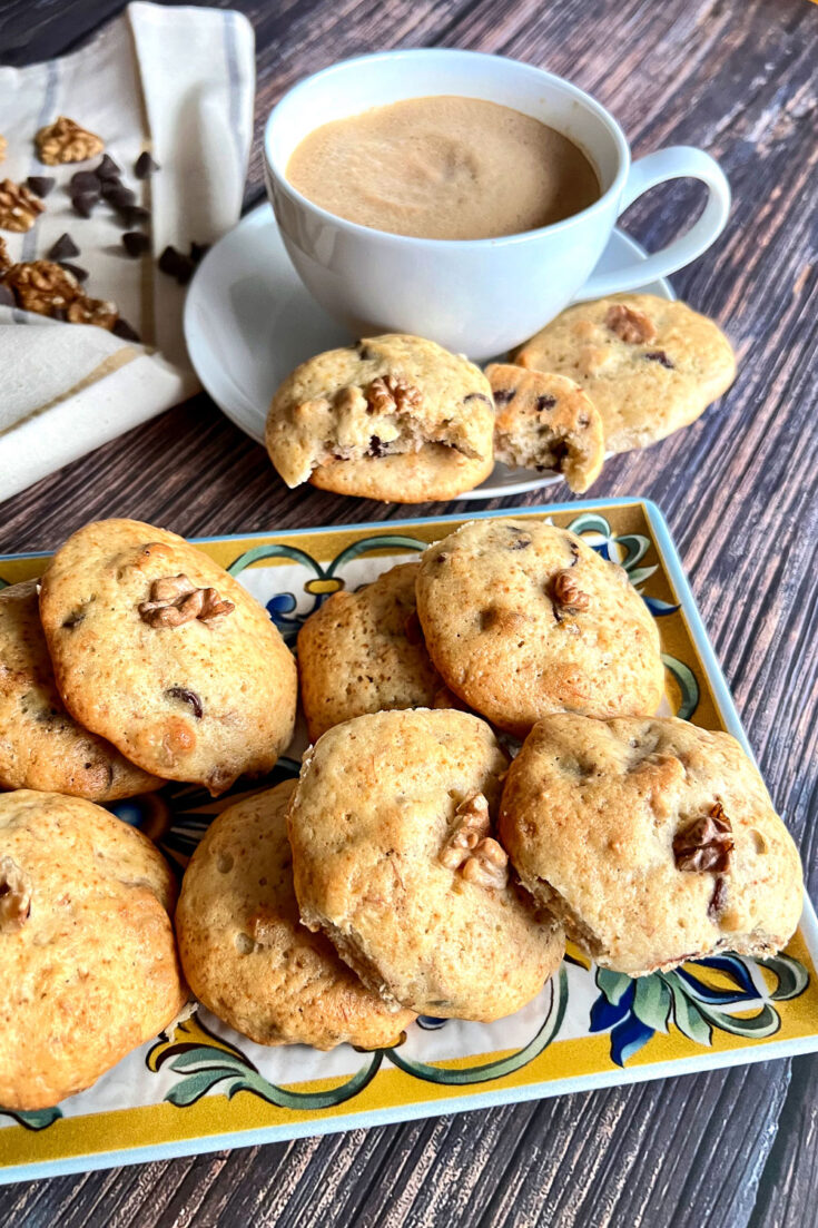 Banana Walnut Chocolate Chips Cookies with coffee in the background