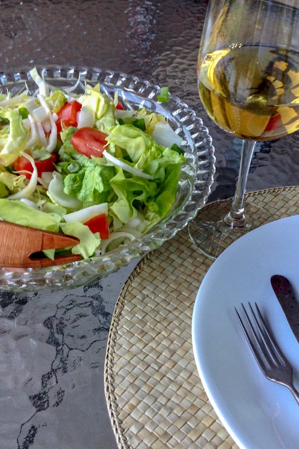 Belgian Endives Boston Lettuce Salad is a simple delicious salad that can be made anytime during the year. Great in the summer though with a glass of wine. Belgian Endives Boston Lettuce Salad with glass of wine