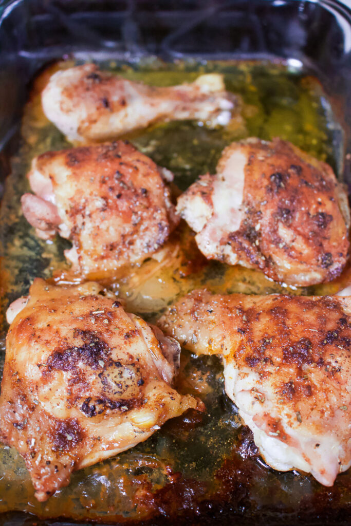 Lemon Garlic Roasted Chicken Legs on a baking tray0