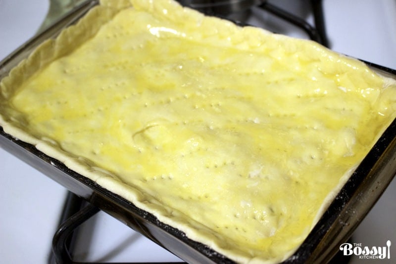 Perfect Easter Puff Pastry Minced Meat Pie Recipe- uncooked pie brushed with eggs ready for the oven