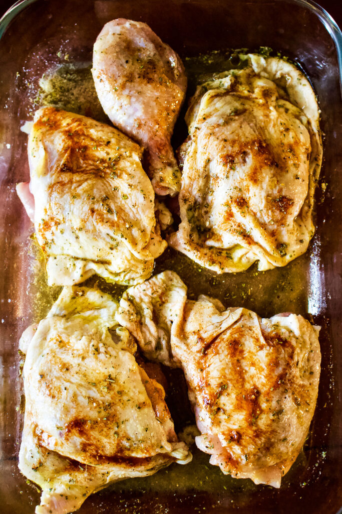 Ready to bake Lemon Garlic Chicken Legs on baking tray