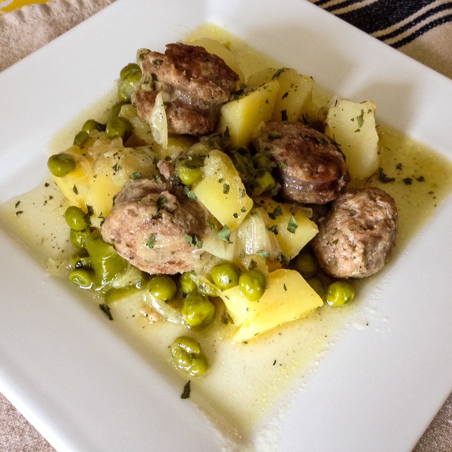 Andouille Sausages with Peas Potatoes and Leeks 1 Andouille Sausages with Peas Potatoes and Leeks -featured picture