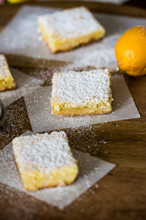 Coconut-Almond Lemon Bars Recipe is a tasty, twisted version of the traditional lemon bars. The combination of coconut, lemon and almond is a perfect one. Coconut-Almond Lemon Bars Recipe -featured picture