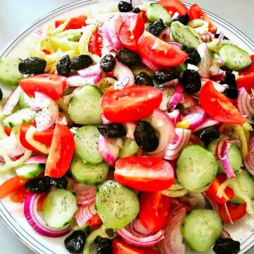 Cucumber Tomato Salad with peppers and onions..