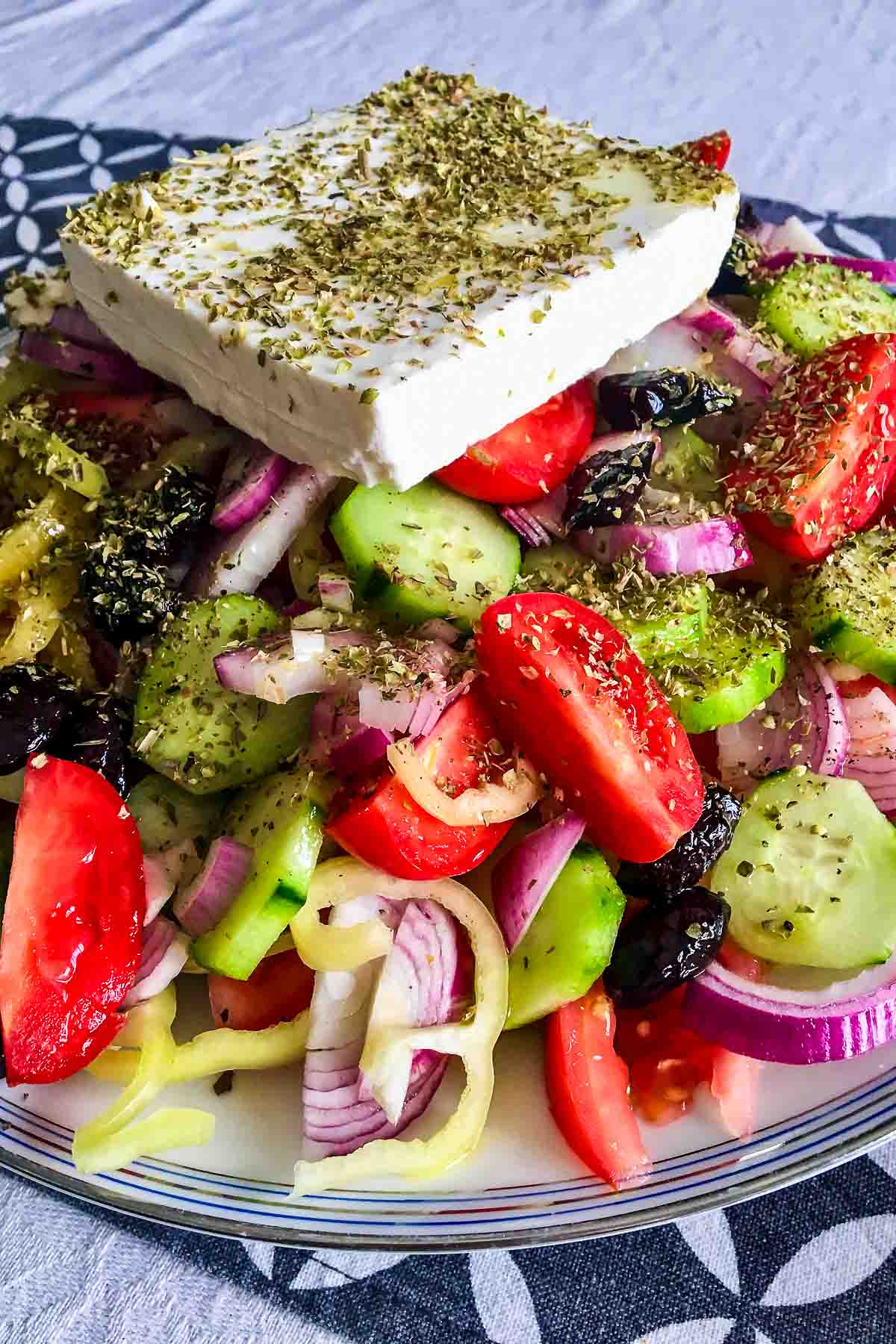 Cucumber Tomato Salad with peppers onions and feta.