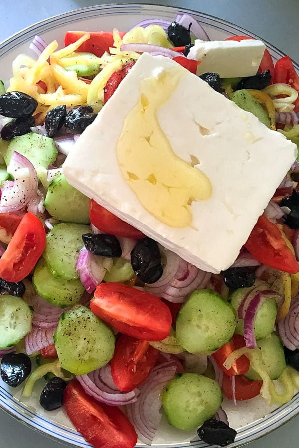 Quick Tomato Cucumber And Pepper Summer salad0 Tomato Cucumber Salad- with Feta cheese and olives in a salad bowl
Greek Salad