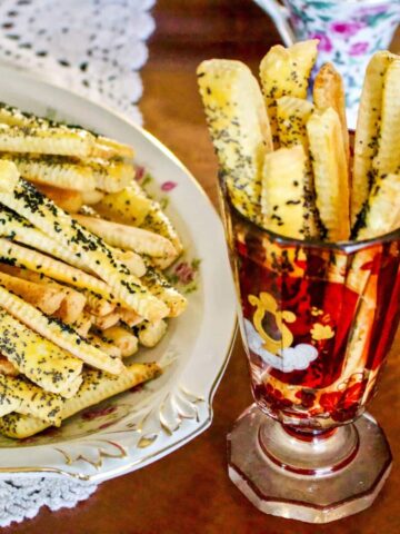 Cheese Straws With Poppy Seeds served on a platter.
