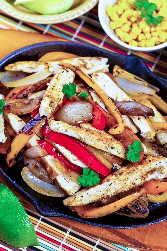 Authentic Mexican Chicken Fajitas Fajitas De Pollo13 1 Mexican chicken fajitas on a cast iron pan0 1