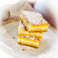 Lemon Ricotta Cheese Cake three slices stacked0