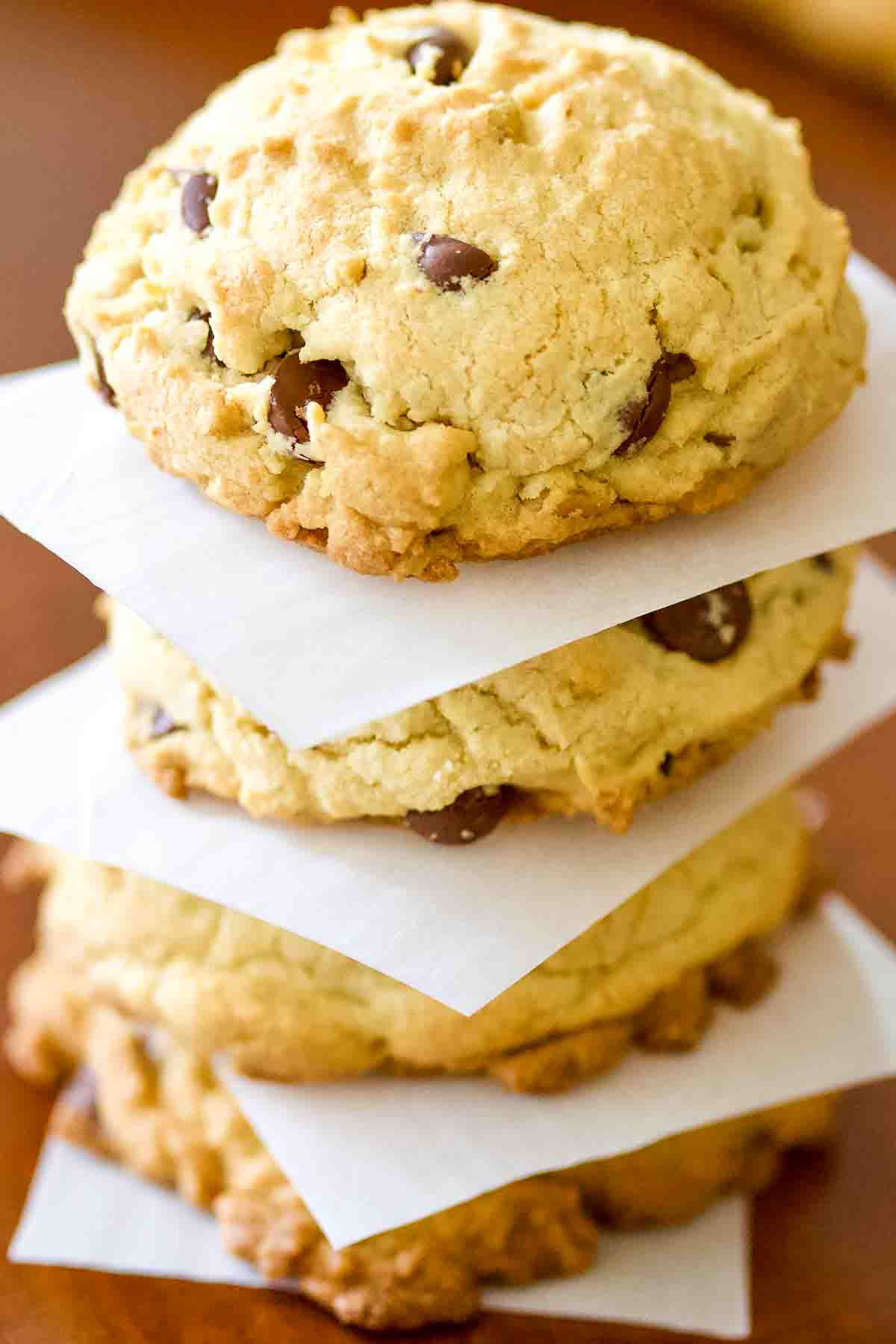 Chocolate Chip Cookies stacked on top of each other.