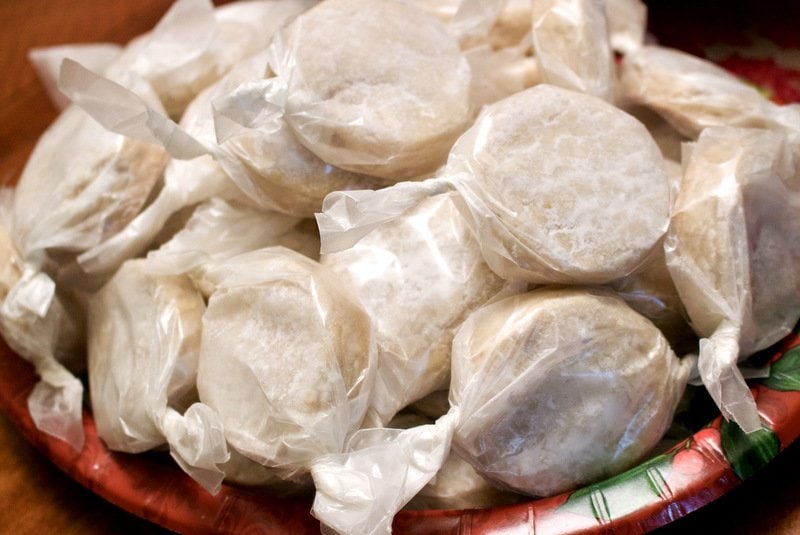 lemon polvorones wrapped in waxed paper