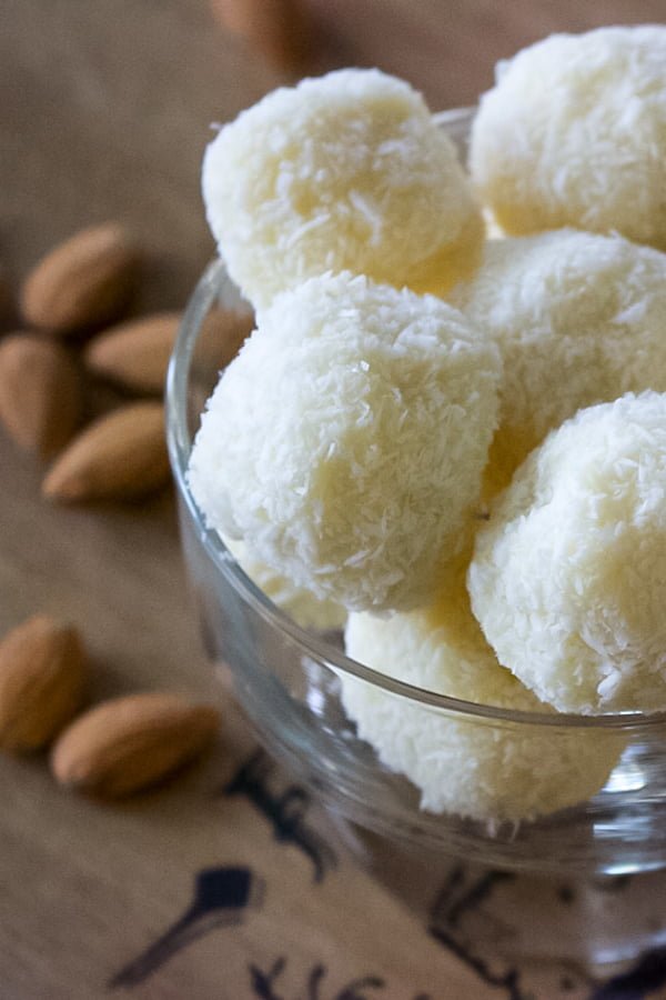 Homemade Raffaello Coconut and Almonds Confections Homemade Raffaello Coconut and Almonds Confections- in a glass bowl-close up