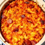 Easy Spanish Chorizo and Tomato Pasta Bake in a white baking dish.