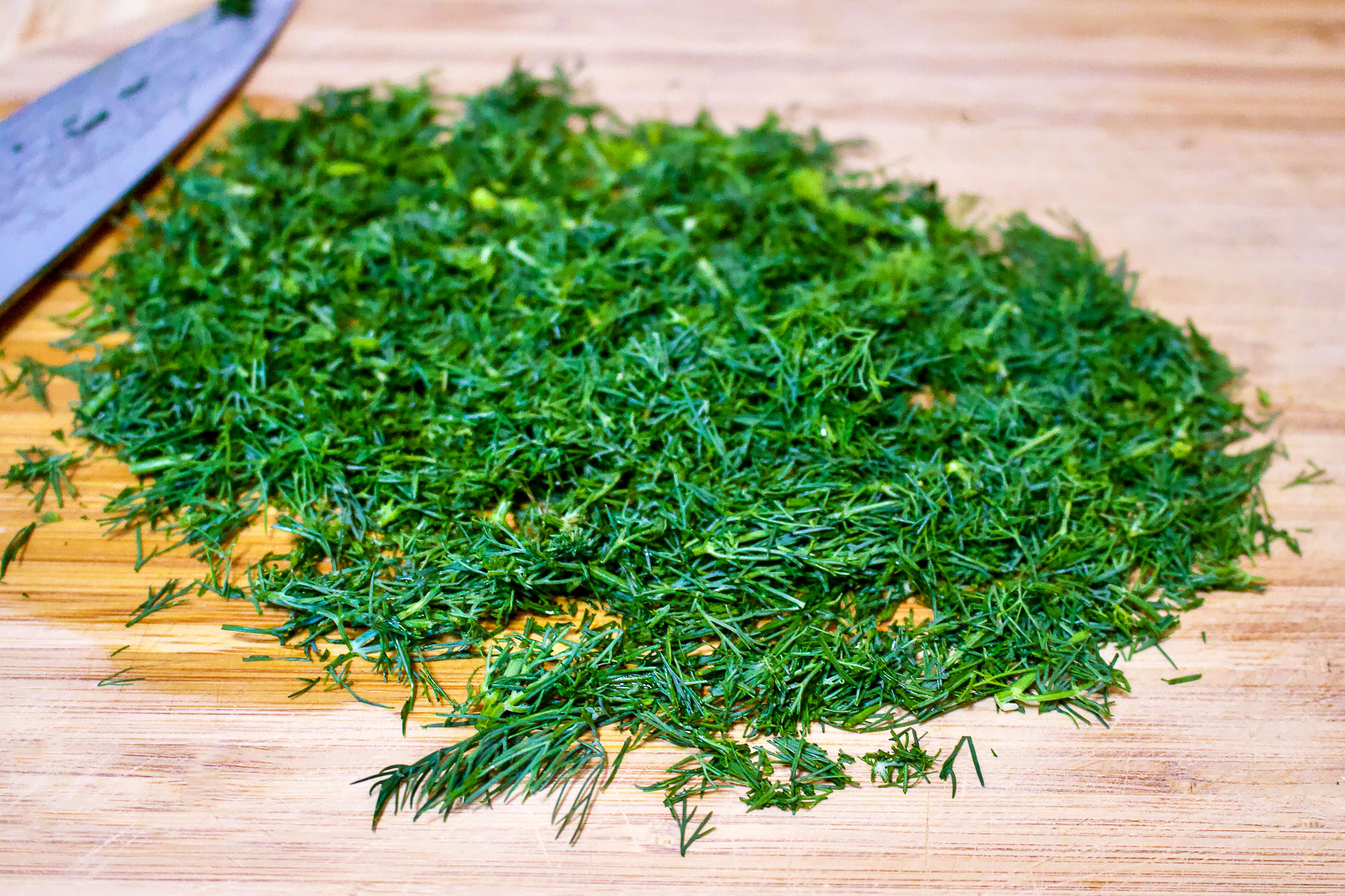 Chopped dill on a cutting board
