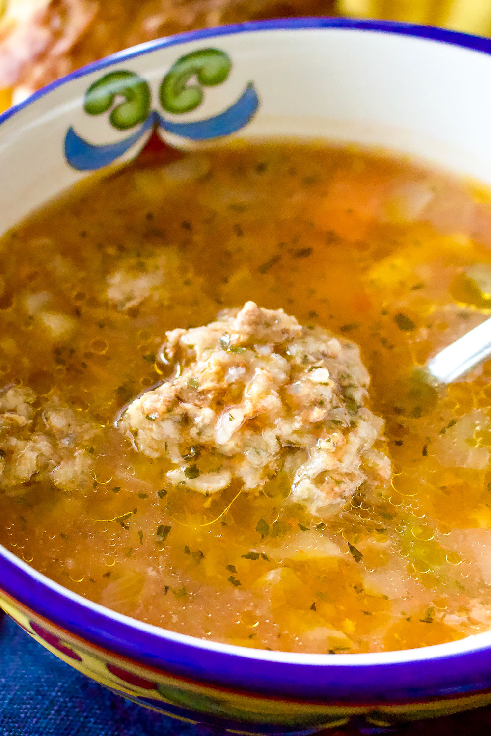 Meatballs Soup in a yellow bowl0