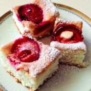 Plum Cake sliced and served on a plate.