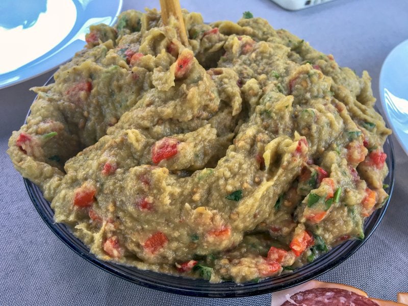 Grilled eggplant and bell pepper salad is a wonderful recipe to make all year long when you have eggplants and peppers available. Perfect as appetizer, or a snack served on slices of good crusty bread, this salad makes a handsome option for entertaining. Grilled eggplant and bell pepper salad