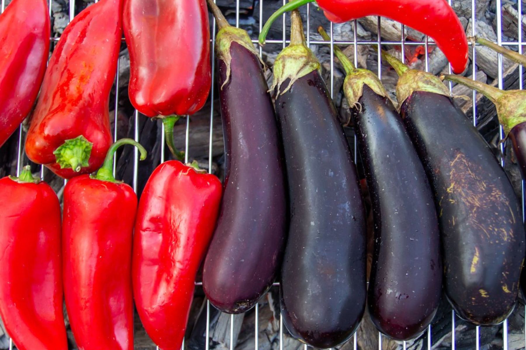 Grilling eggplants and peppers.
