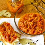 Zacusca vegetable spread with slice of bread.