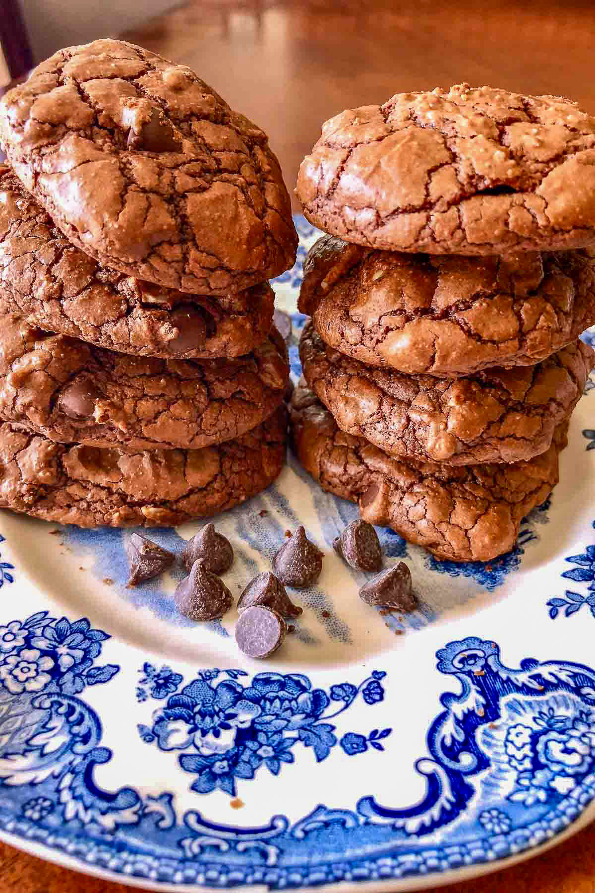 Chocolate Walnut Cookies stacked on a plate.