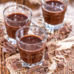 Chocolate liqueur in a glass square photo.