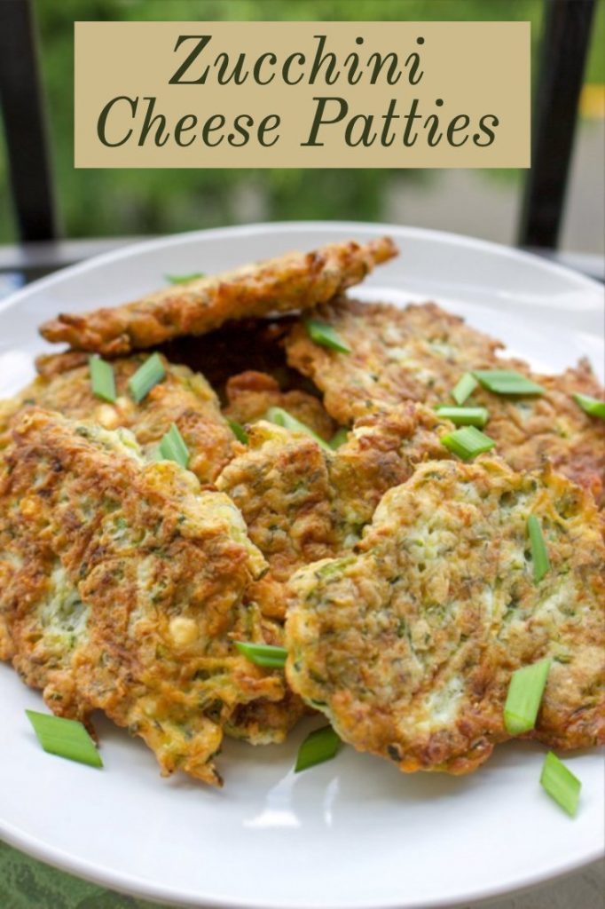Zucchini Cheese Patties  on a white plate- featured picture for Pinterest