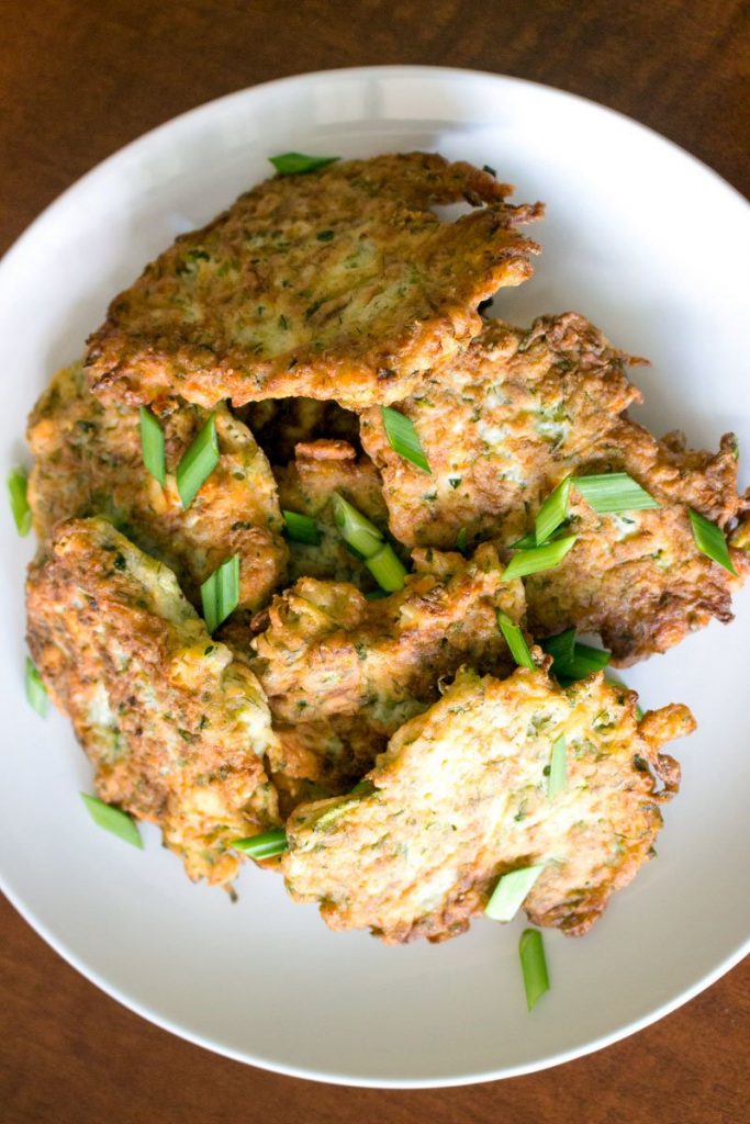Zucchini Feta Cheese Patties on a white plate