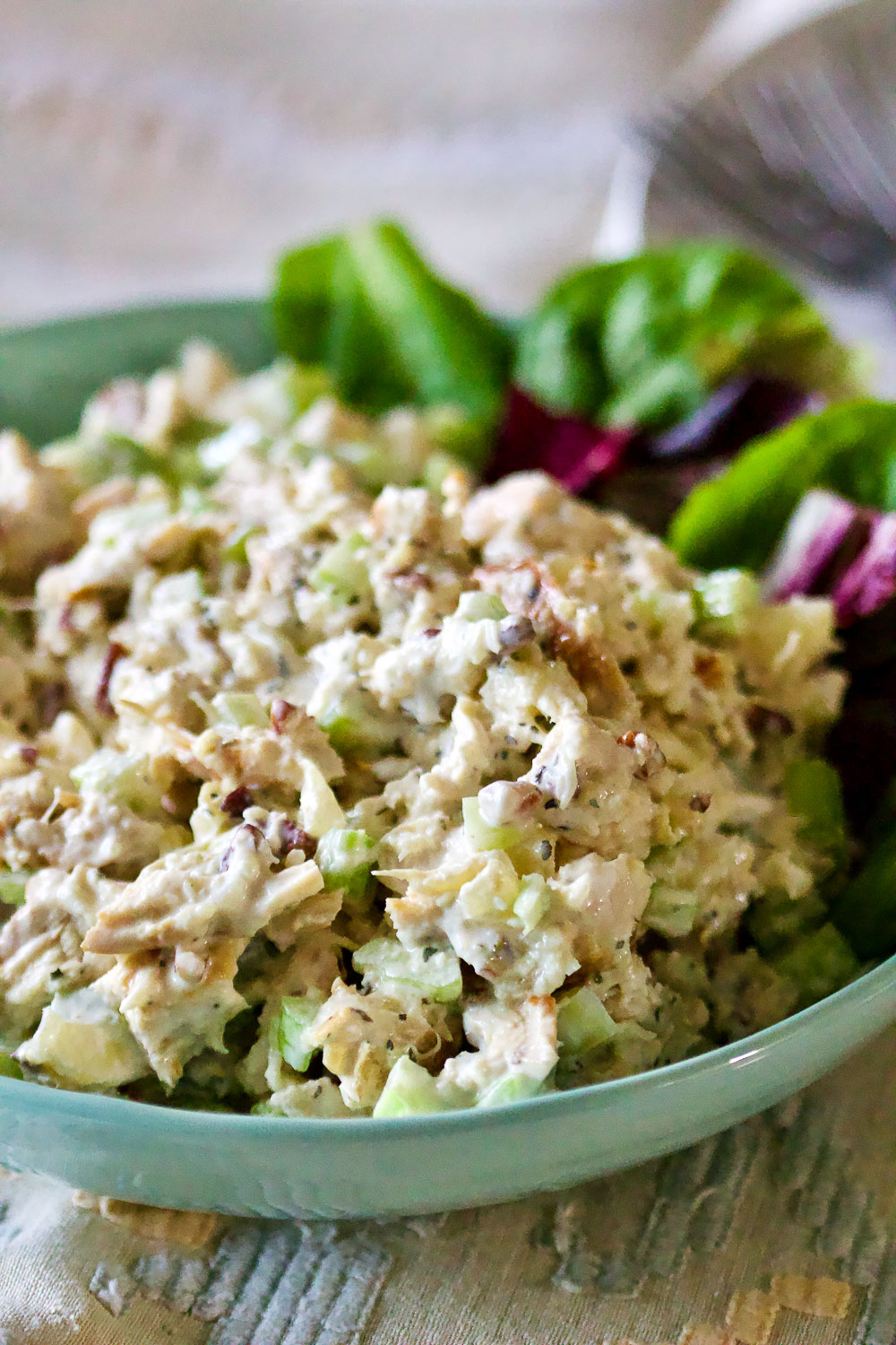 Classic Pineapple Chicken Salad is easy to make, healthier and delicious. The dressing is made with creamy Greek yogurt instead of mayonnaise. Pineapple Chicken Salad in a blue bowl0