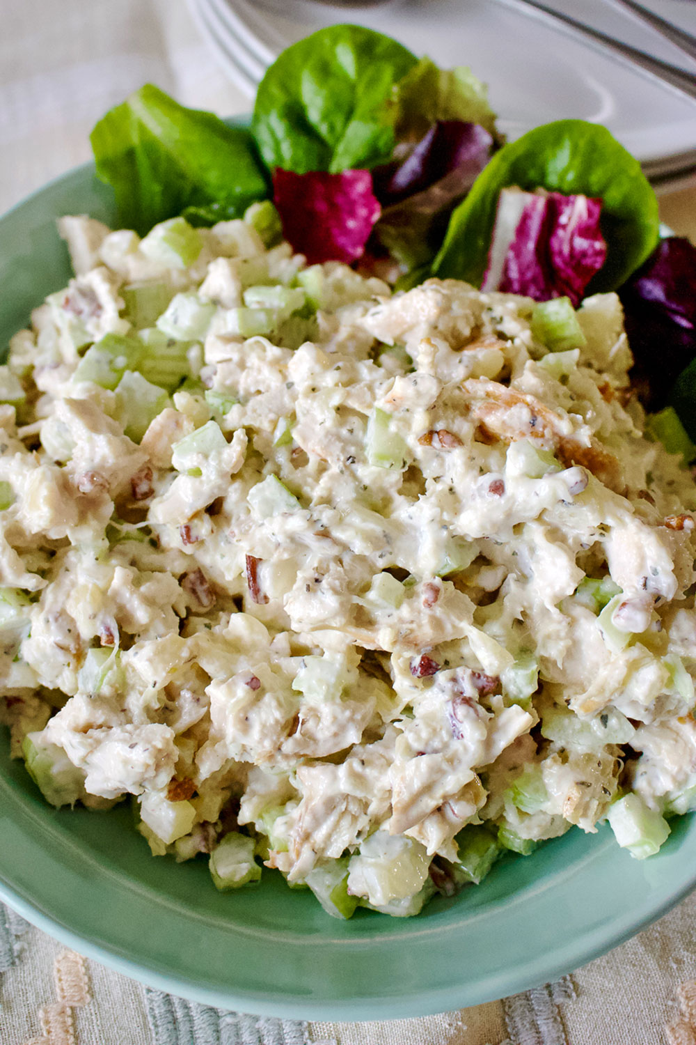 Classic Pineapple Chicken Salad is easy to make, healthier and delicious. The dressing is made with creamy Greek yogurt instead of mayonnaise. Pineapple Chicken Salad on greens0