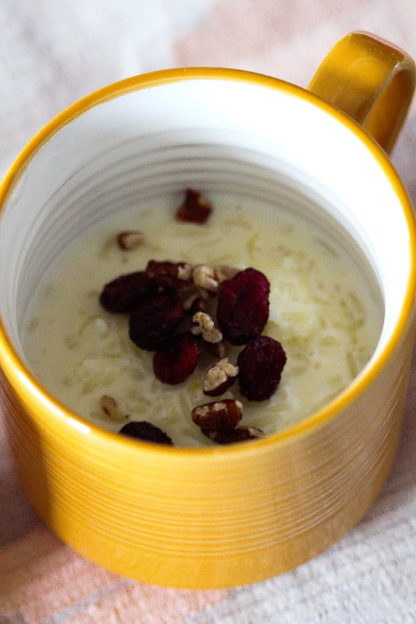 Classic Stove-Top Rice Pudding with dried cranberries and walnuts