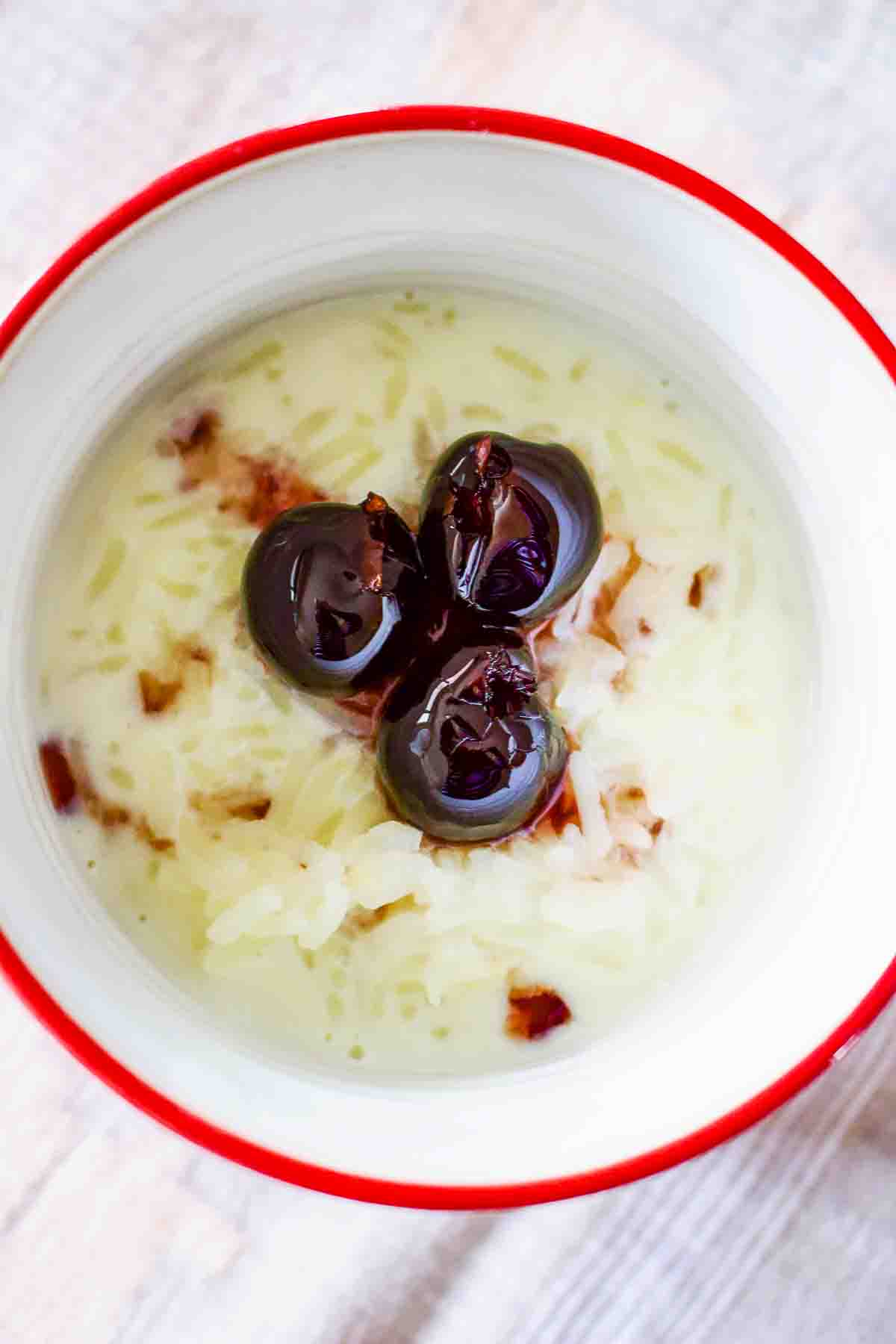 Classic Stove-Top Rice Pudding- Classic Rice Pudding decorated with sour cherry jam.