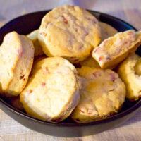 Ham and Black Pepper Scones on black plate square photo0
