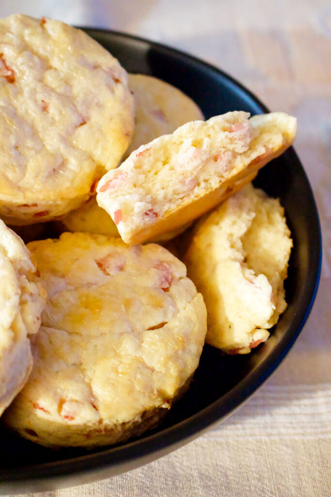 Ham and Black Pepper Scones on black plate0
