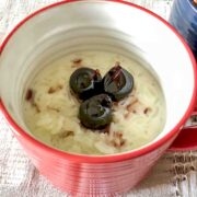 Rice pudding in a red cup.