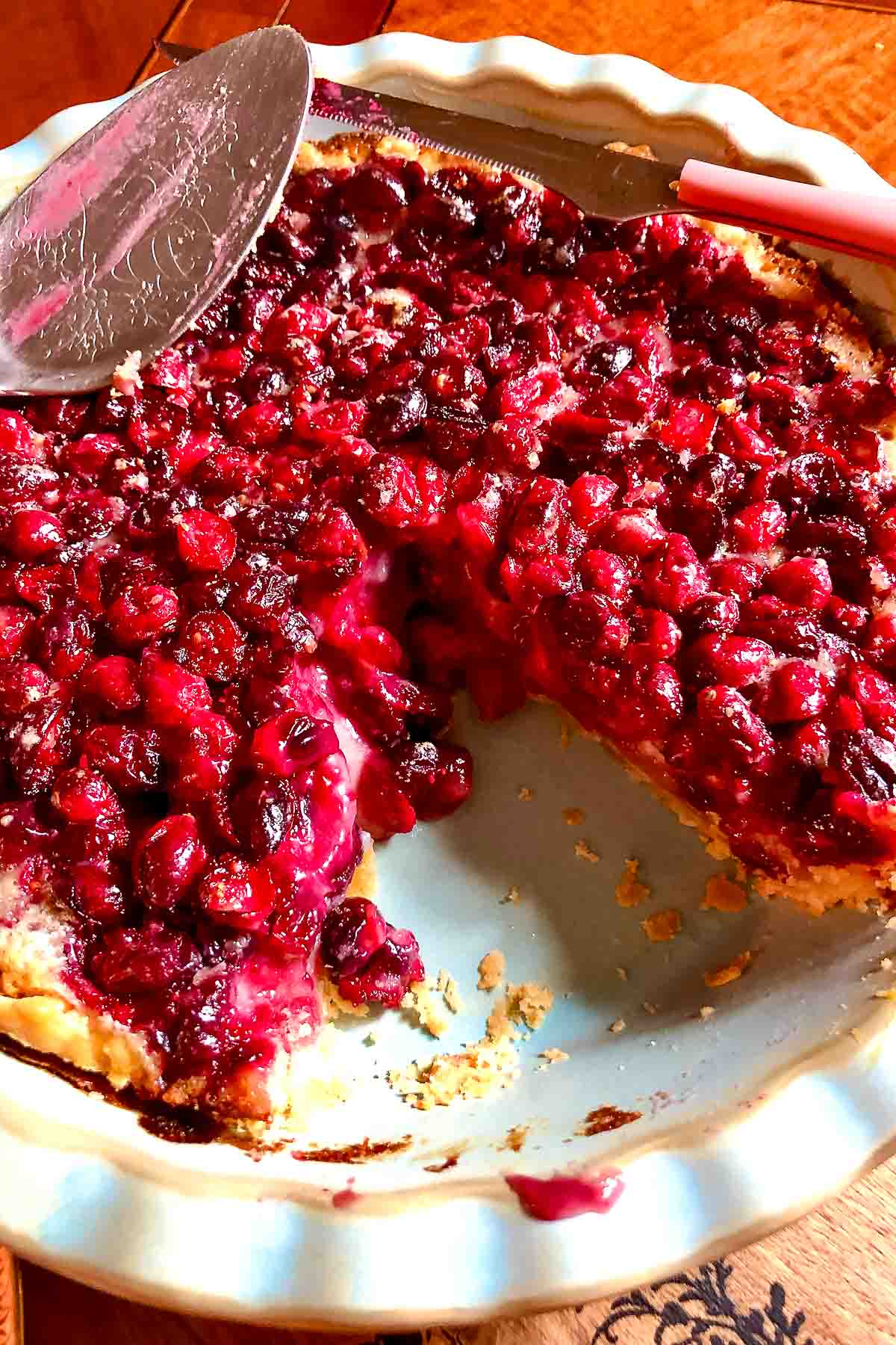 Cranberry Custard Pie sliced in the baking pan.