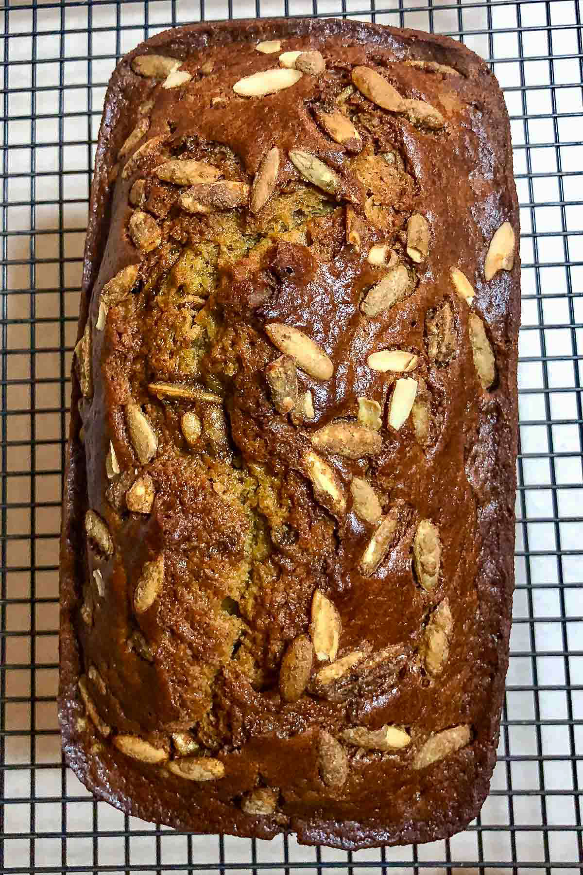 Pumpkin Seed And Apricot pumpkin Sweet Bread- This is a very moist and delicious recipe of pumpkin bread. The surprise in this bread is the addition of dried apricots and the candied pumpkin seeds sprinkled over the bread. Loaf of Apricot Pumpkin Bread.