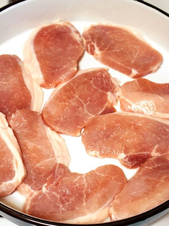 slices of pork in the baking pan