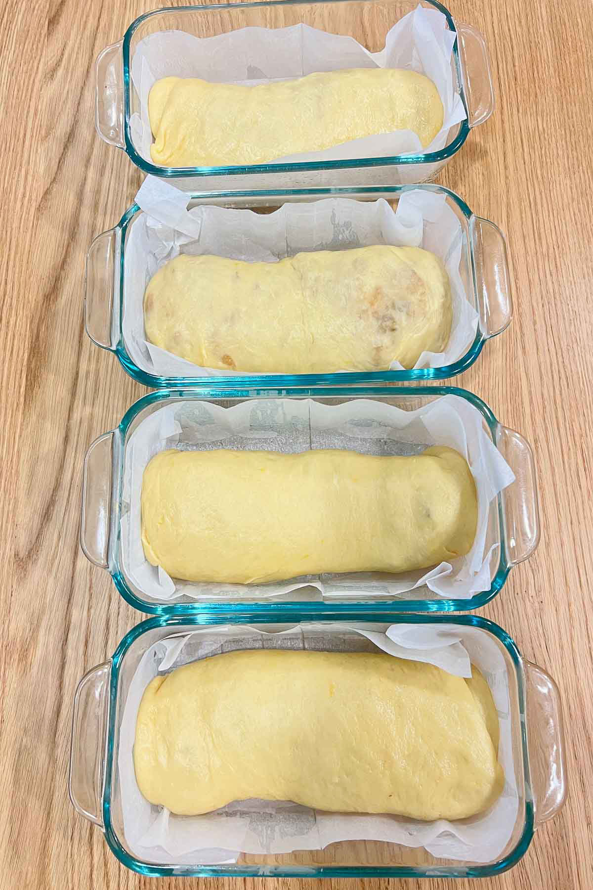 Unbaked Sweet bread in baking pans.