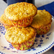 Banana Nut Muffins on a white and blue plate.