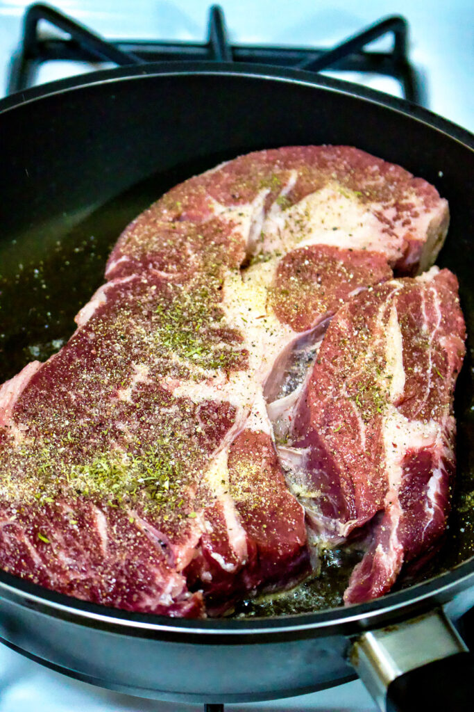 How To Make A Classic Chuck Roast with Vegetables22 Beef Roast in the pan with spices0