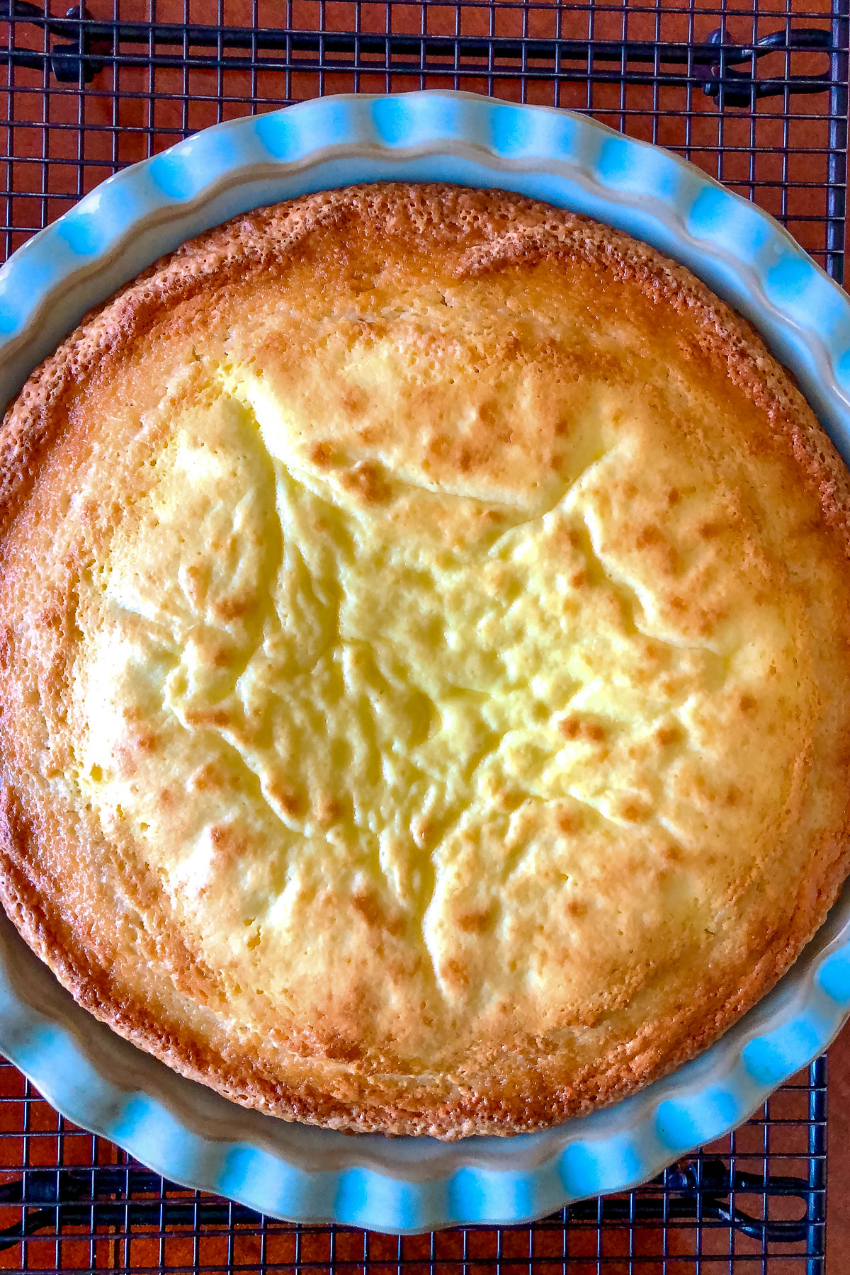Easter cheesecake cooling on a wire rack